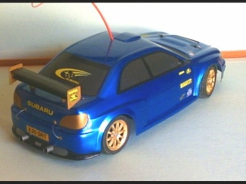 Carroceria azul de coche de rally para radiocontrol con aleron trasero
