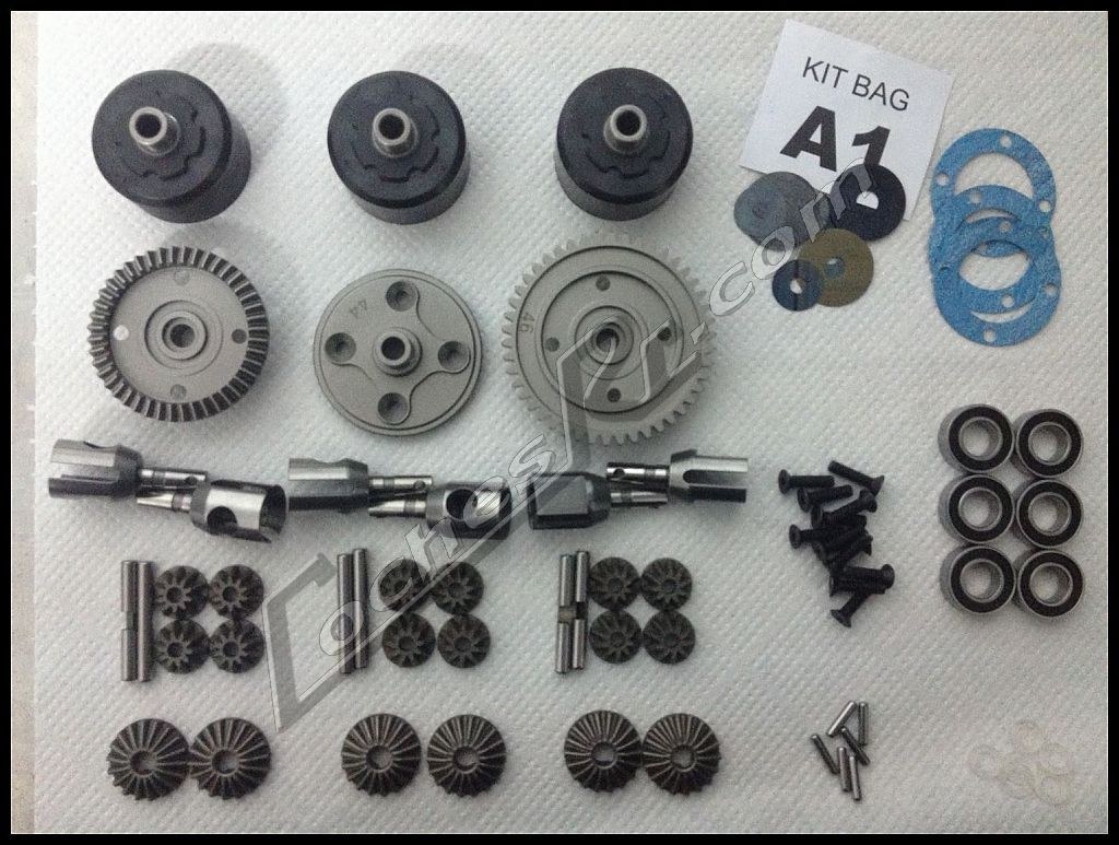 Todas las piezas de un kit de diferencial de coche RC ordenadas sobre la mesa antes de montarlo