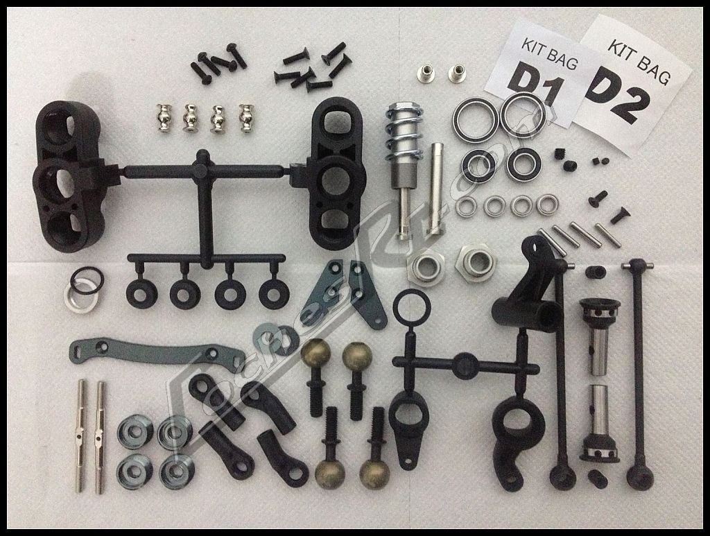 Bieletas, rotulas y piezas de direccion de un kit de coche RC