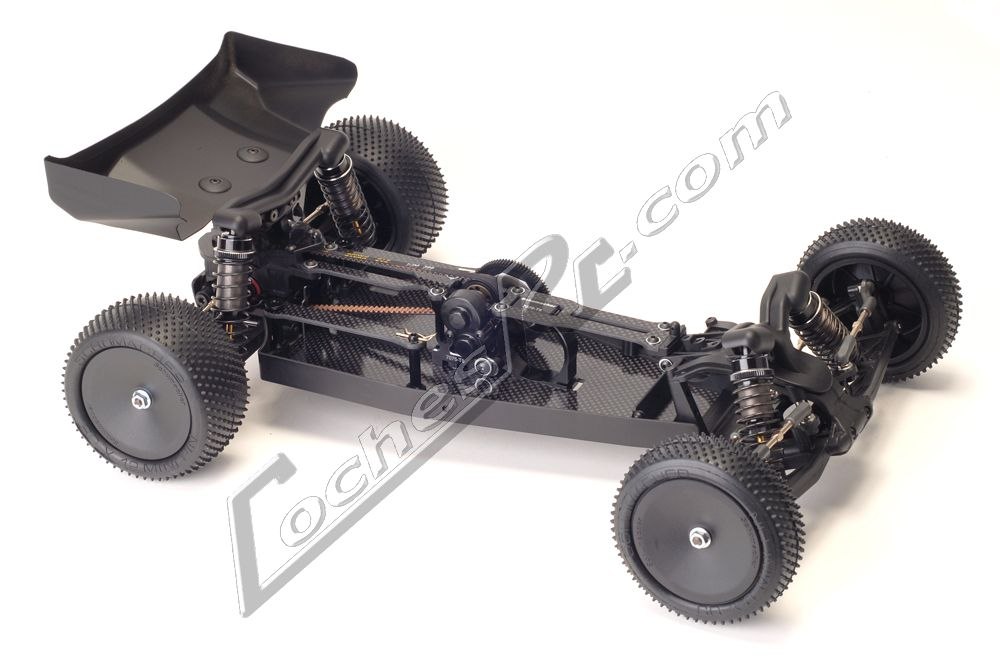 Buggy de competicion Schumacher Cougar KF de dos ruedas motrices, en negro y sin carroceria, visto de tres cuartos sobre fondo blanco